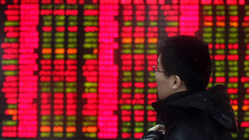 Investors Watch Stock Bords At A Security Firm