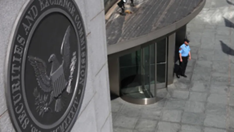 A security officer stands outside the U.S. Securities and Exchange Commission headquarters