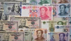 Paper money of the USA and China.